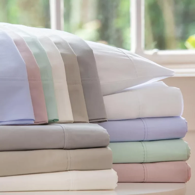 como dobrar roupas de cama